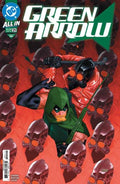 Cover of Green Arrow #21 featuring the character Green Arrow in a fighting stance with a red and black background, surrounded by skull motifs.
