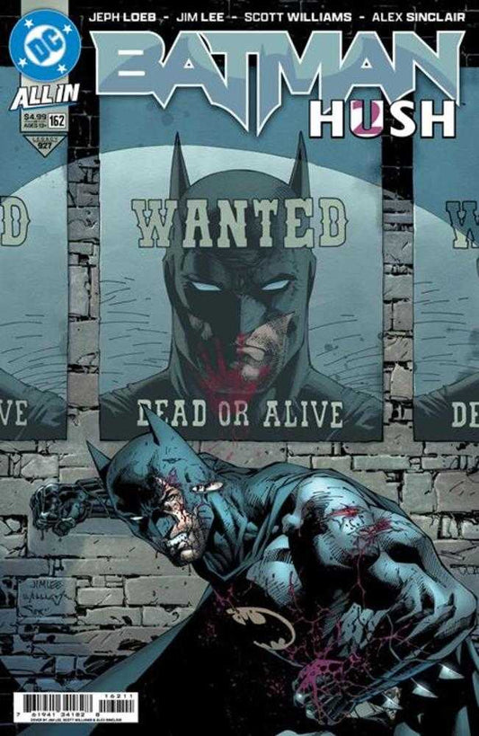 Comic book cover of Batman featuring a 'Wanted' poster and a defeated Batman on a stone wall background.