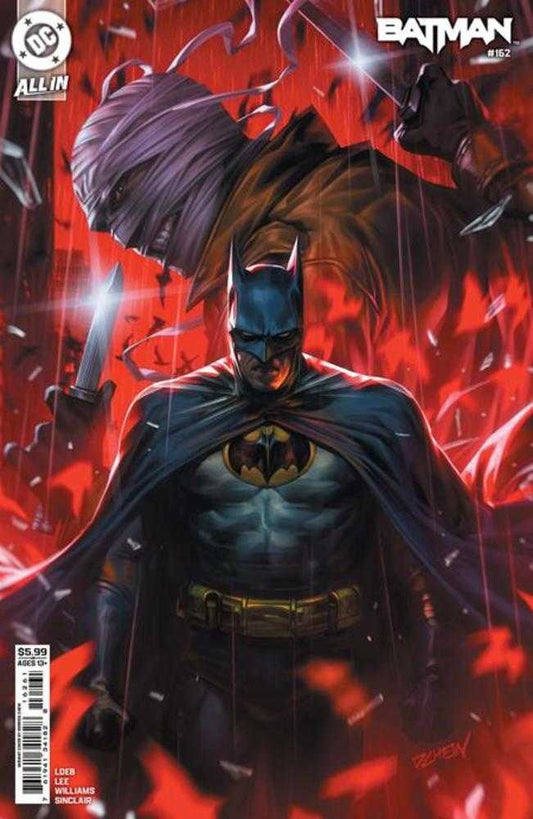Comic book cover featuring Batman in a dark and dramatic pose with red flames in the background.