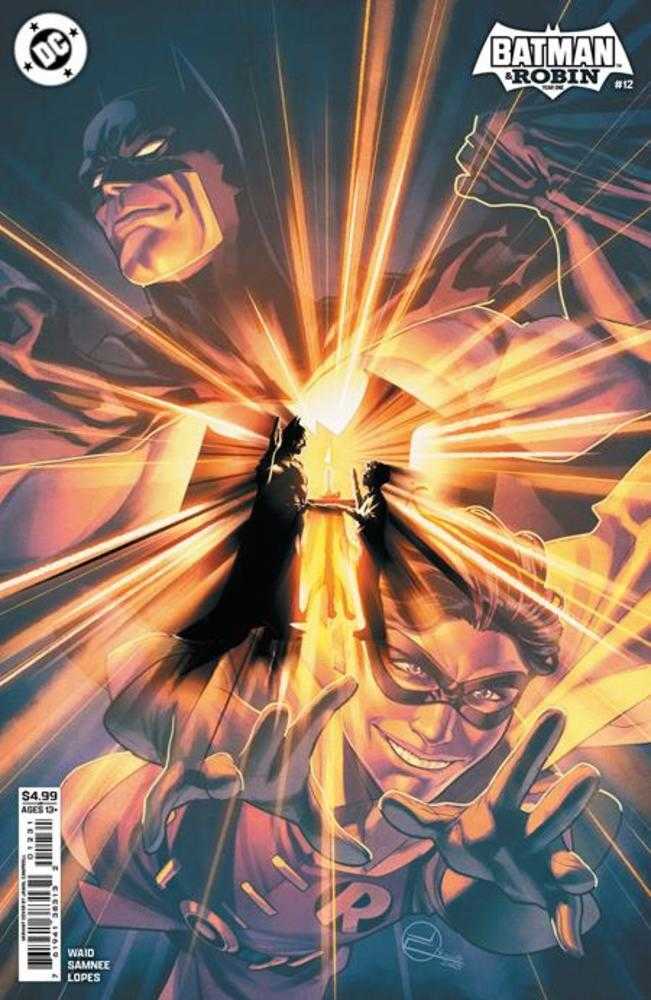Comic book cover featuring Batman and Robin with dynamic lighting effects.
