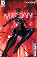 Comic book cover featuring Catwoman in a black suit with red background