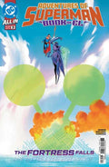 Comic book cover of 'Adventures of Superman Book of El' with Superman and a character flying over balloons and smoke.