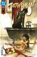 Comic book cover featuring a character in a bathtub with a child and cat, titled 'Catwoman'.