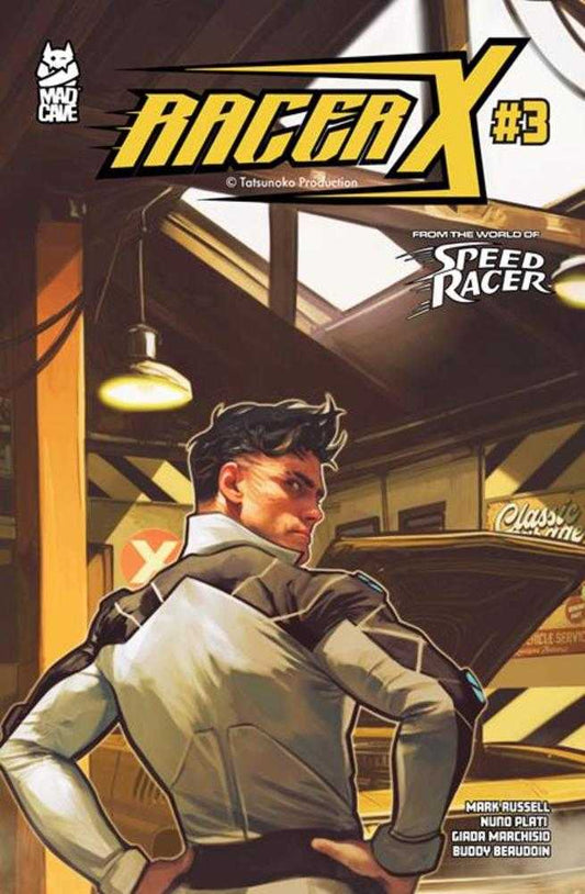 Comic book cover of 'Racer X' with a character in a high-tech outfit standing in a garage.