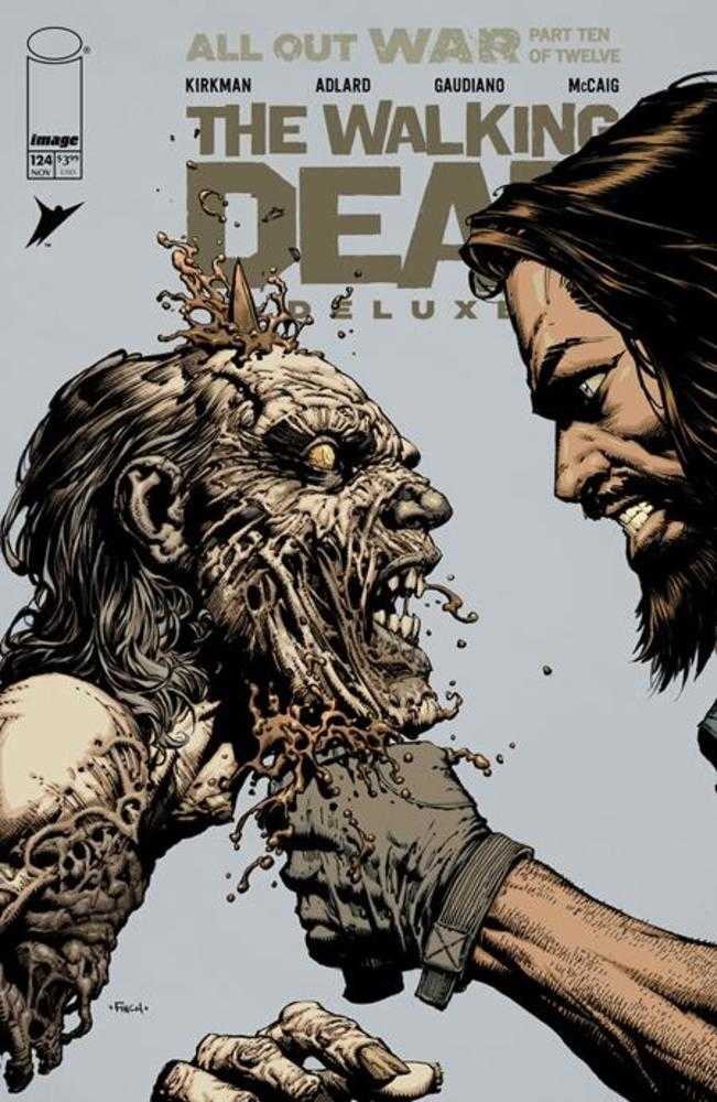 Comic book cover of 'The Walking Dead' featuring a zombie and a human hand.