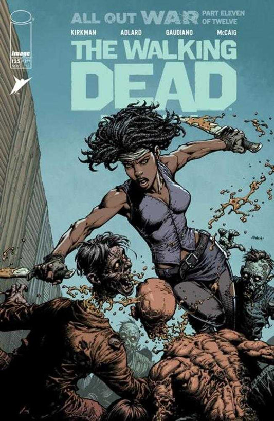 Comic book cover of 'The Walking Dead' featuring a character with zombies in the foreground.