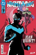 Comic book cover featuring Nightwing with a red background and text 'Man Hunt!'.