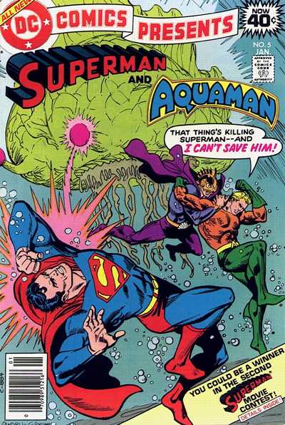 Comic book cover featuring Superman and Aquaman with a green alien creature.