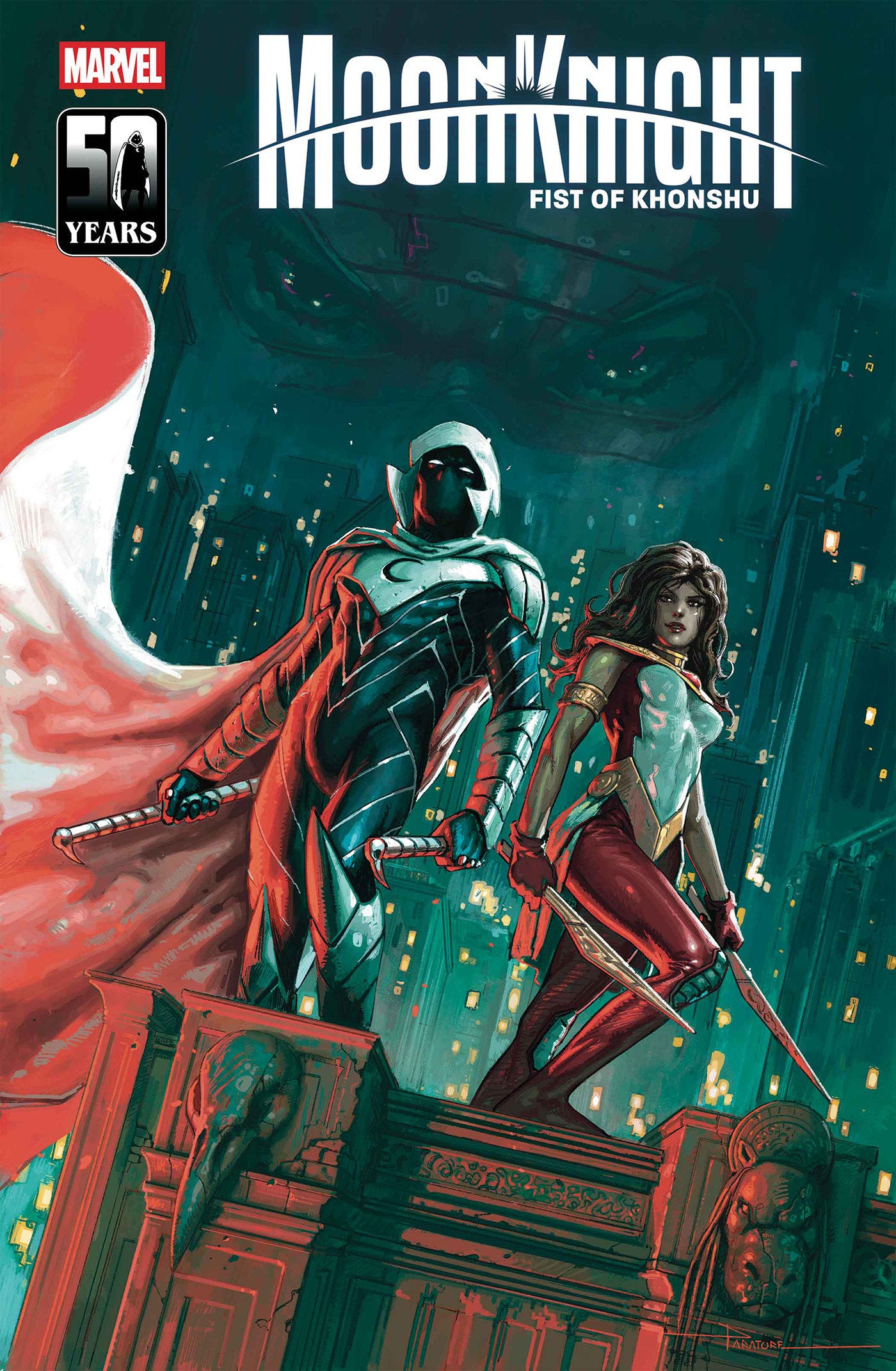 Comic book cover featuring two characters on a pedestal with 'Marvel' and 'Moon Knight' branding.