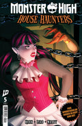 Monster High House Haunters comic book cover with a character in a pink dress and chains.