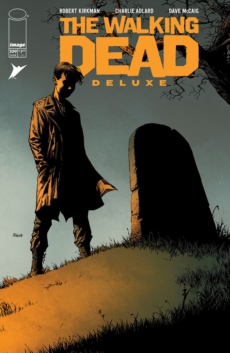 Comic book cover for The Walking Dead Deluxe issue 100, featuring a dark illustrated scene of a man standing beside a tombstone under a pale sky, with large orange title text at the top.